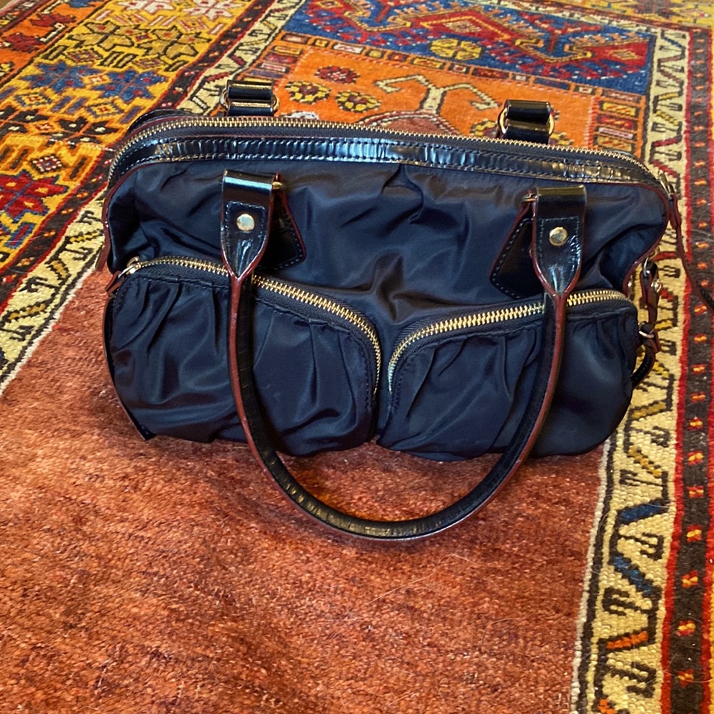 Classic MZ Wallace black purse. Gold tone hardware.